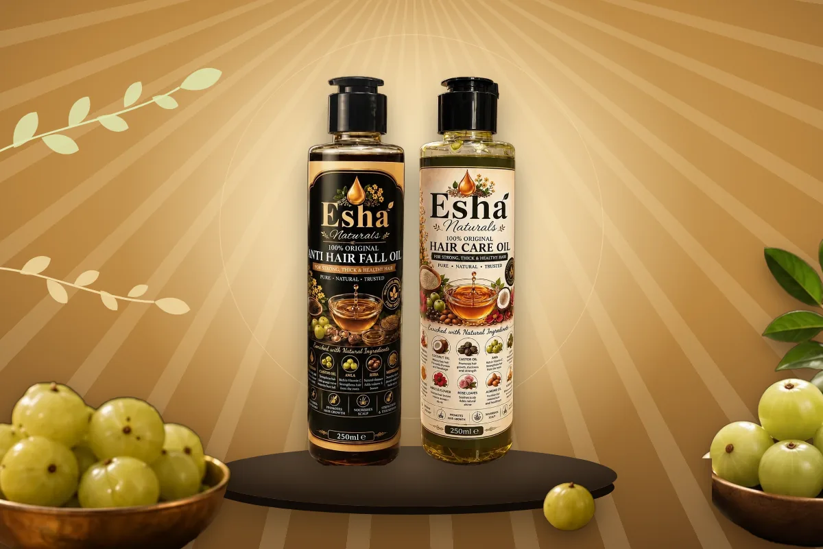 Esha Naturals Anti Hair Fall Oil and Hair Care Oil side by side with fresh amla