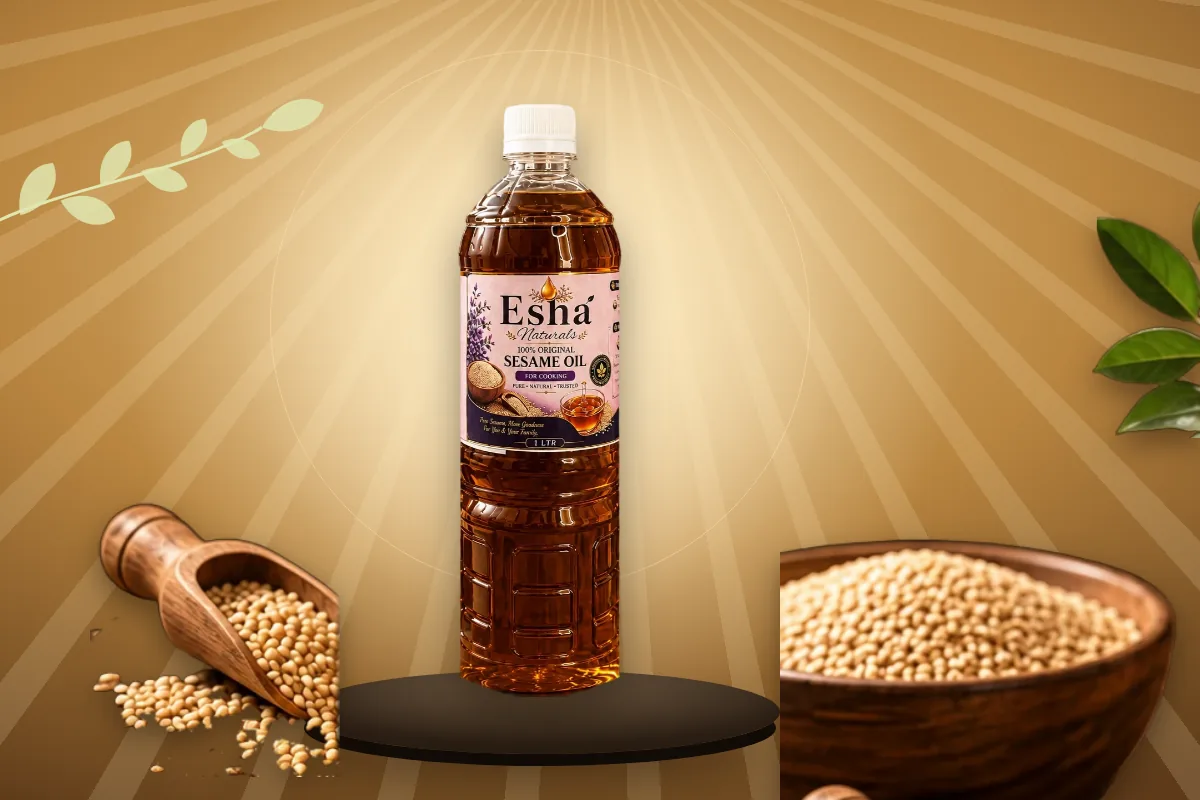 A wooden bowl of sesame seeds beside Esha Naturals Sesame Oil